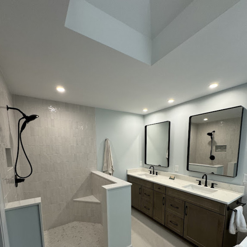 Bathroom with walk-in shower and recessed ceiling lights