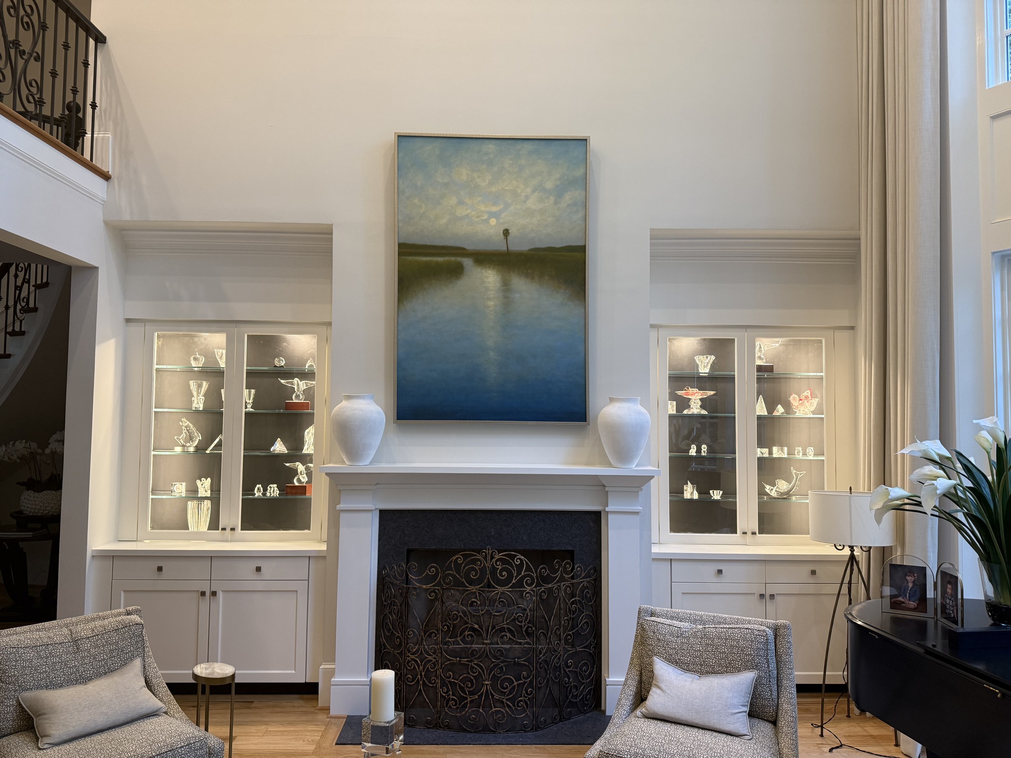 Living room with built-in shelving and fireplace