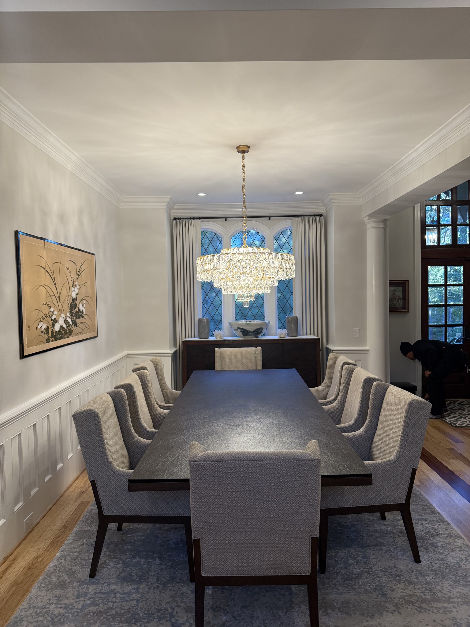 Dining room with chandelier and pendant lighting