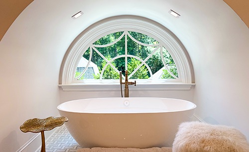 Modern bathroom remodel with freestanding soaking tub and skylight, Garner NC